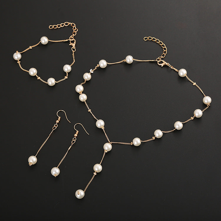 Elegant Pearl Jewelry Set: Necklace, Earrings, Bracelet