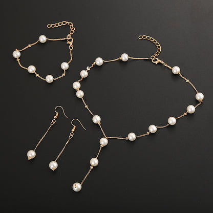 Elegant Pearl Jewelry Set: Necklace, Earrings, Bracelet