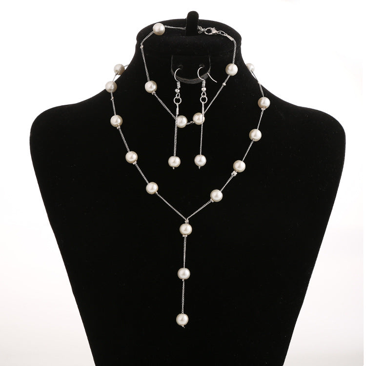 Elegant Pearl Jewelry Set: Necklace, Earrings, Bracelet