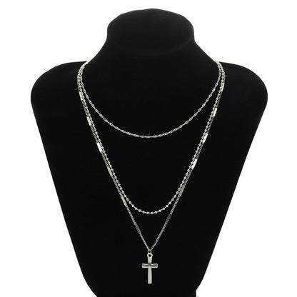 Gold Layered Cross Necklace with Three-Tier Pendant