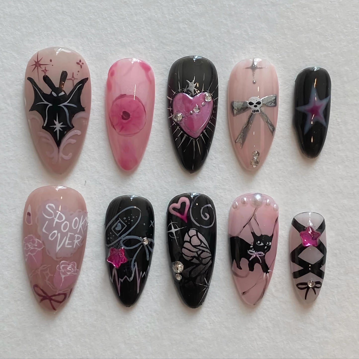 BABALAL Almond Press on Nails Medium Fake Nails Black Pink Glue ons Nails Y2k Bat Cat Bow Design Goth Acrylic Nails 24Pcs Cute Halloween False Nails Star Stiletto Nails