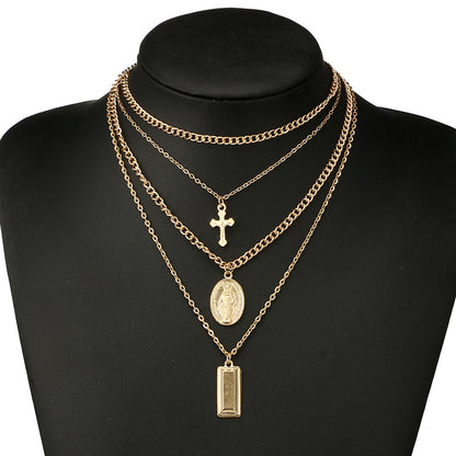 Multi-Layer Necklace with Cross and Virgin Mary Design