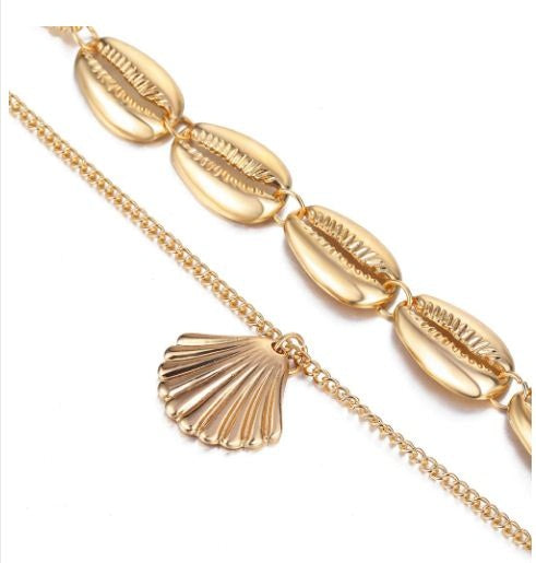 Versatile Metal Layered Necklace with Shell Pendant