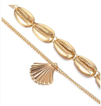 Versatile Metal Layered Necklace with Shell Pendant