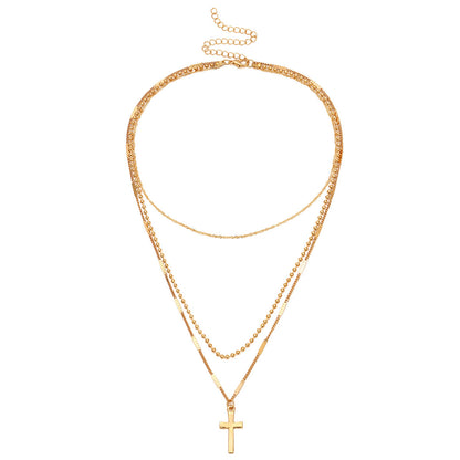 Gold Layered Cross Necklace with Three-Tier Pendant
