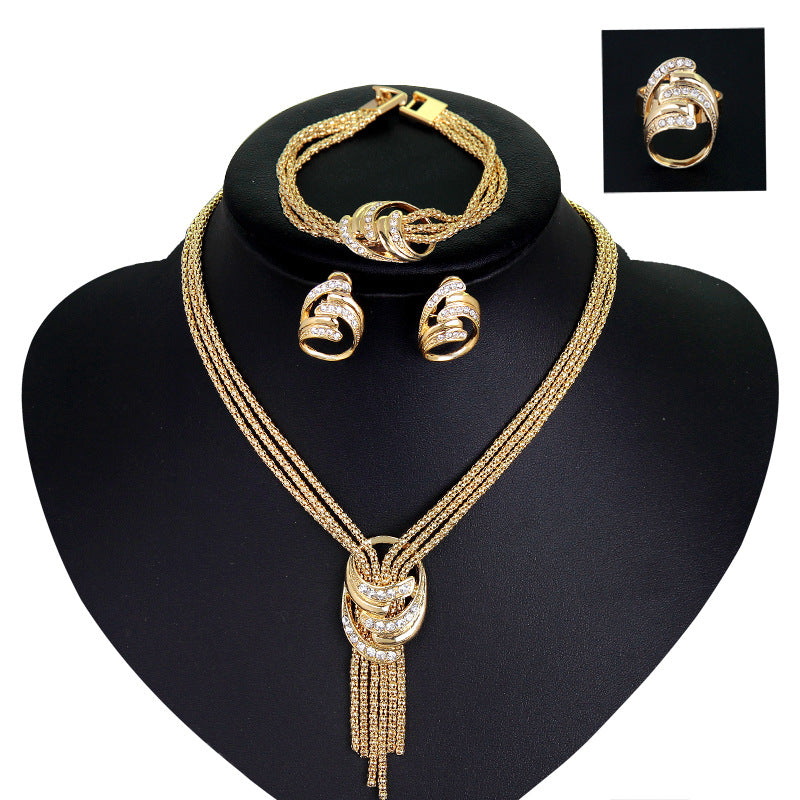 Four-Piece Bridal Jewelry Set: Necklace, Bracelet, Earrings, Ring