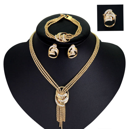 Four-Piece Bridal Jewelry Set: Necklace, Bracelet, Earrings, Ring