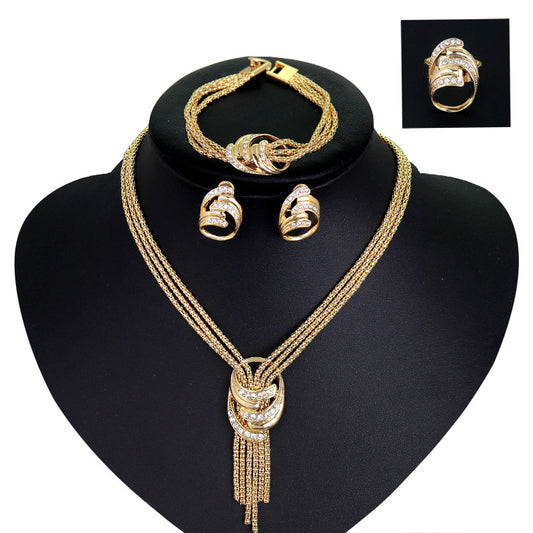 Four-Piece Bridal Jewelry Set: Necklace, Bracelet, Earrings, Ring