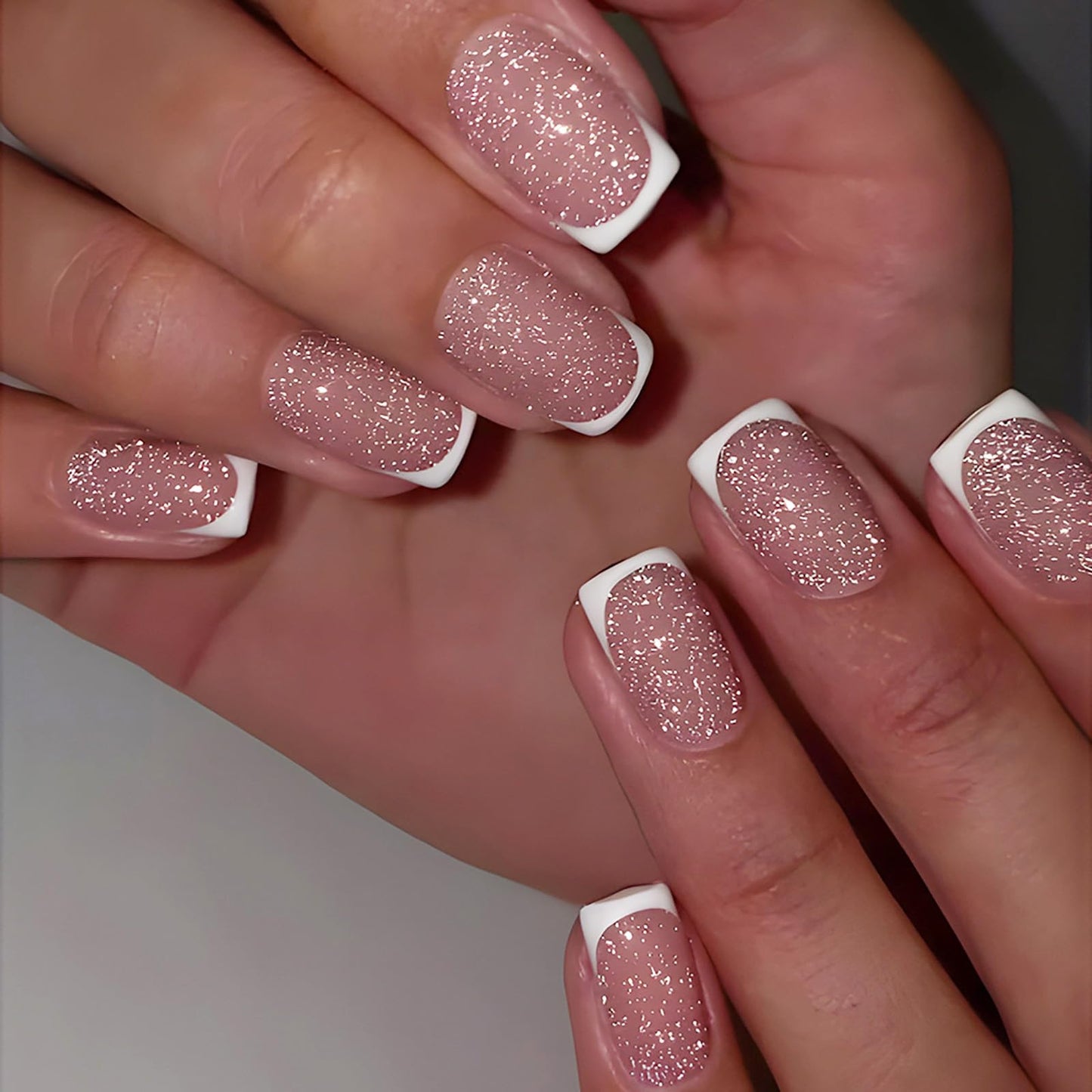 Rilafuvu Press on Nails Short Fake Nails Glitter Nail Press ons French Tip Nails Square Glue on Nails Pink Acrylic Nails Summer Nails Glossy Artificial Nails for Women and Girls 24pcs