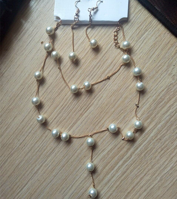 Elegant Pearl Jewelry Set: Necklace, Earrings, Bracelet