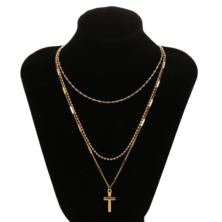 Gold Layered Cross Necklace with Three-Tier Pendant