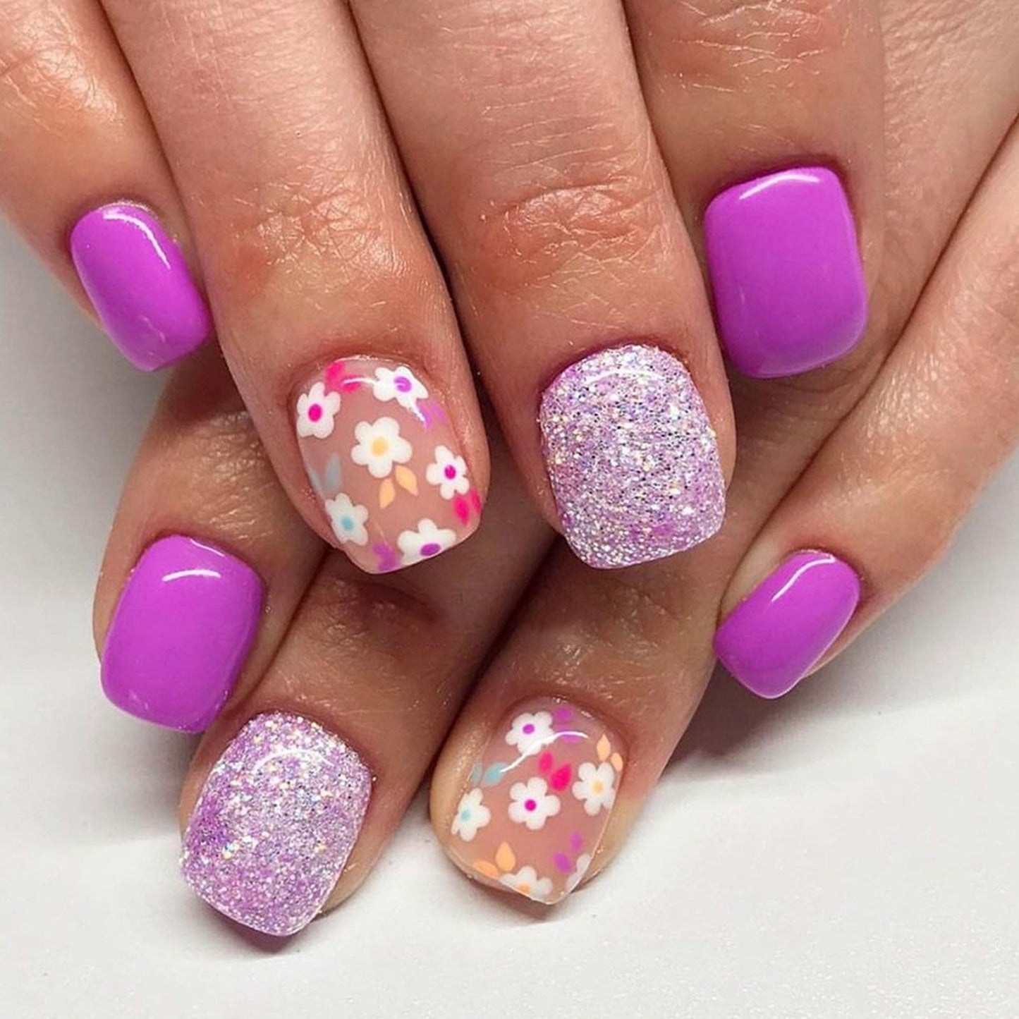 Square Press on Nails Short Fake Nails with Glitter Flower Designs Purple Nails Press ons Glossy Glue on Nails Nude Acrylic Nails Spring Summer False Nails Artificial Stick on Nails for Women 24Pcs