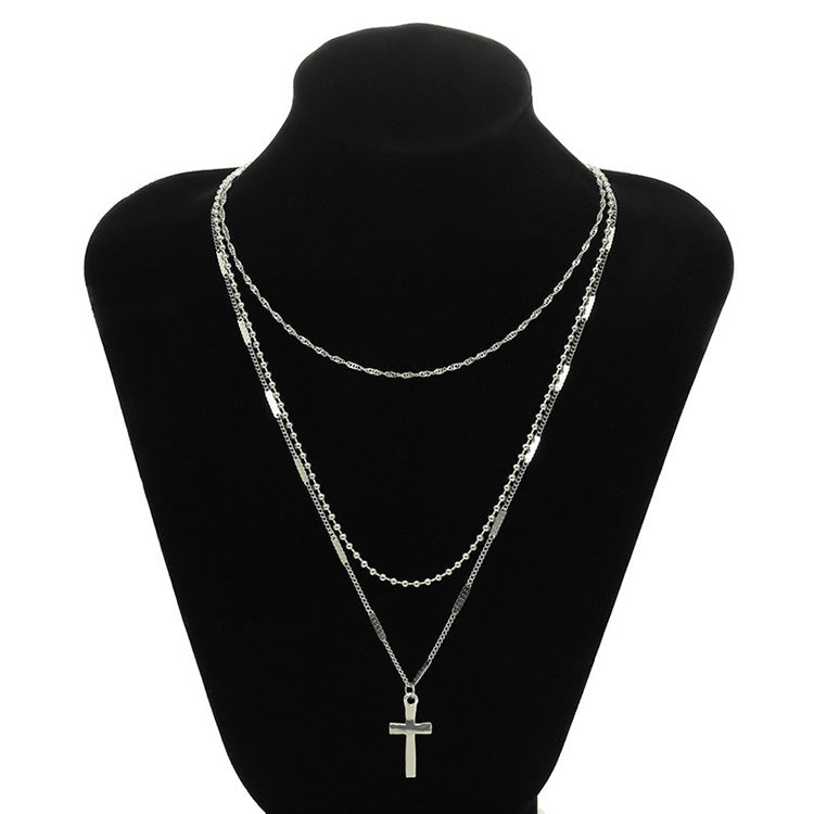 Gold Layered Cross Necklace with Three-Tier Pendant