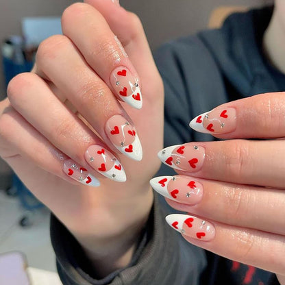 Valentines Day White French Tip Press on Nails Almond Medium Fake Nails with Red Heart Rhinestones Designs Valentines False Nails Press ons Acrylic Glossy Glue Stick on Nails for Women 24 Pcs