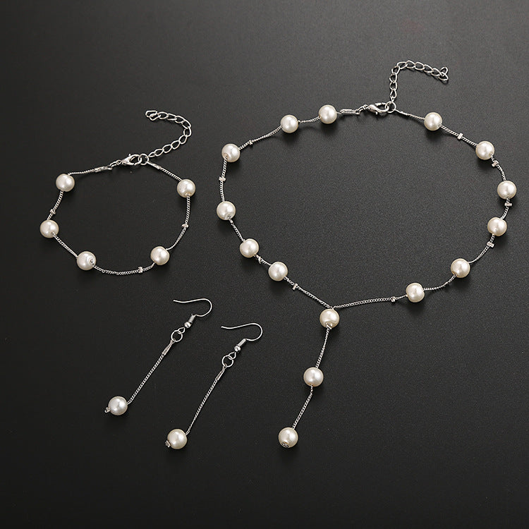 Elegant Pearl Jewelry Set: Necklace, Earrings, Bracelet