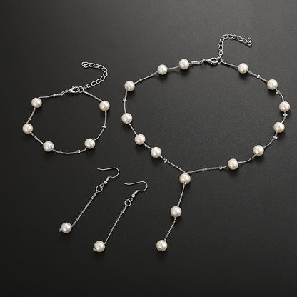 Elegant Pearl Jewelry Set: Necklace, Earrings, Bracelet